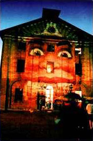 The face of Luna Park projected on Hyde Park Barracks, Sydney Festival, 1993.